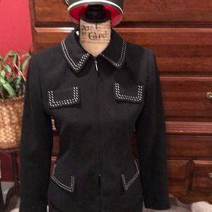 Ladies Two piece black suit with white piping.
